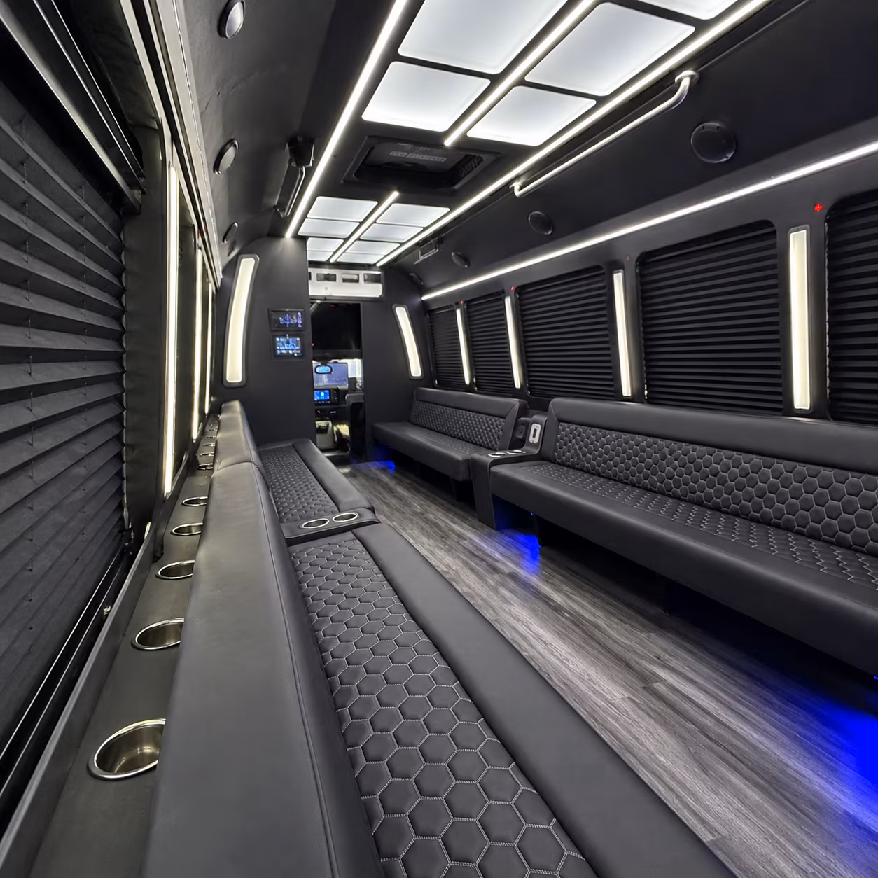 Group beside a Mercedes Sprinter limo in Dayton