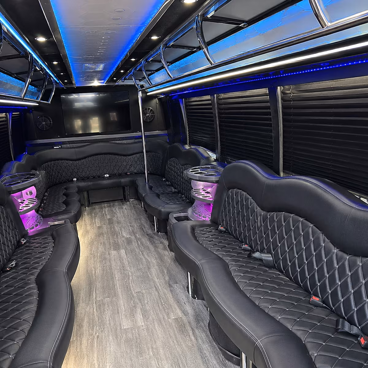 Wedding guests seated inside a party bus serving Dayton